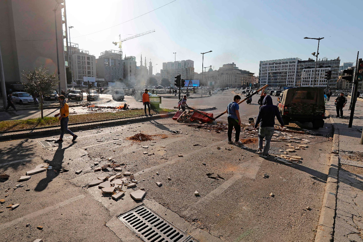 Lebanese anti-government protesters set up a roadblock in the downtown area of the capital Beirut