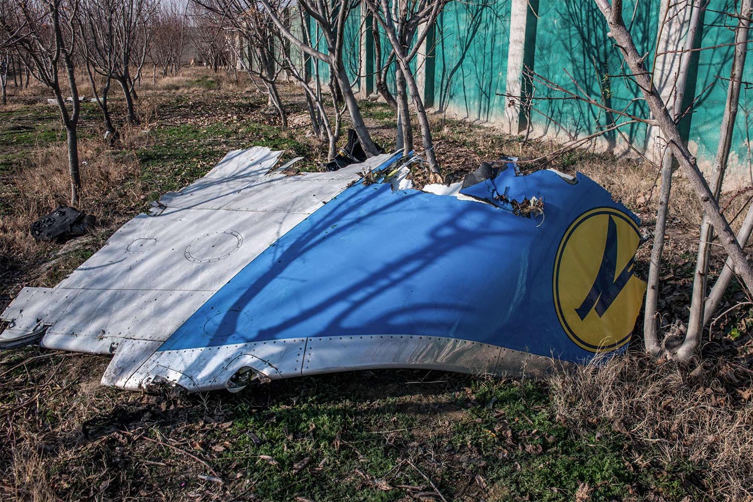 A piece of airplane fuselage at the scene, where a Ukrainian airplane carrying 176 people crashed