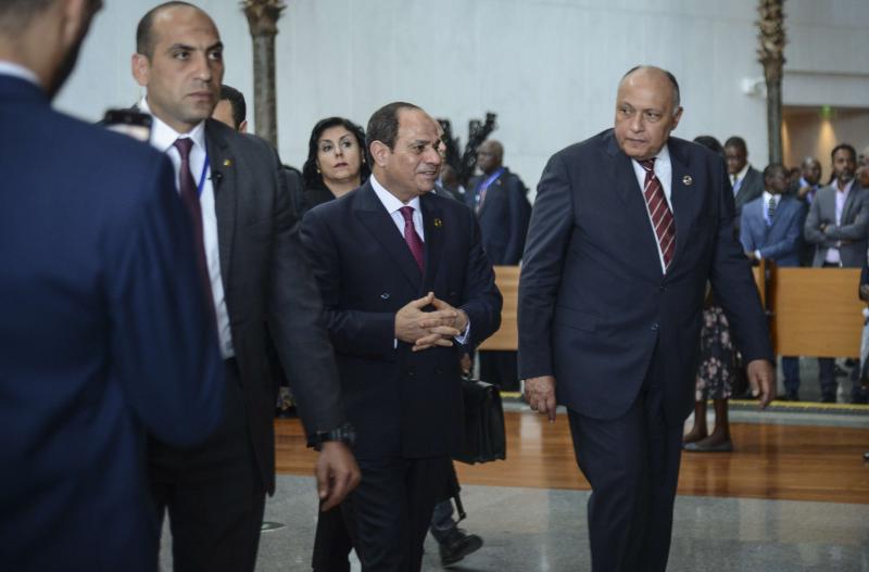 Egyptian President Abdel Fattah al-Sisi (C), the outgoing Chairman of the African Union, arrives for the opening session of the 33rd AU Summit at the AU headquarters in Addis Ababa