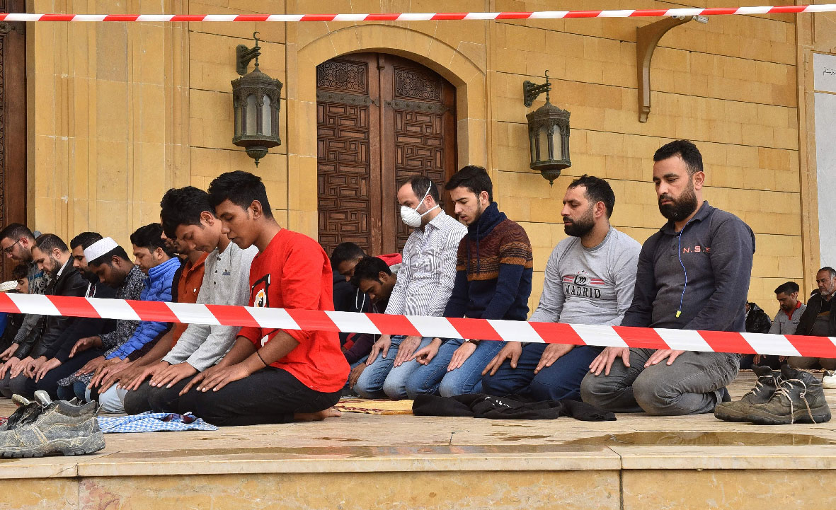 Muslim men pray at Lebanon's Sunni Mohammed Al-Amin mosque in Beirut