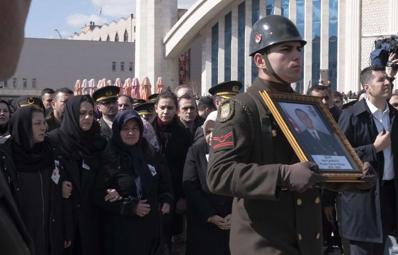 Family members attend a funeral ceremony in Ankara, March 1, for one of the Turkish soldiers killed in Idlib