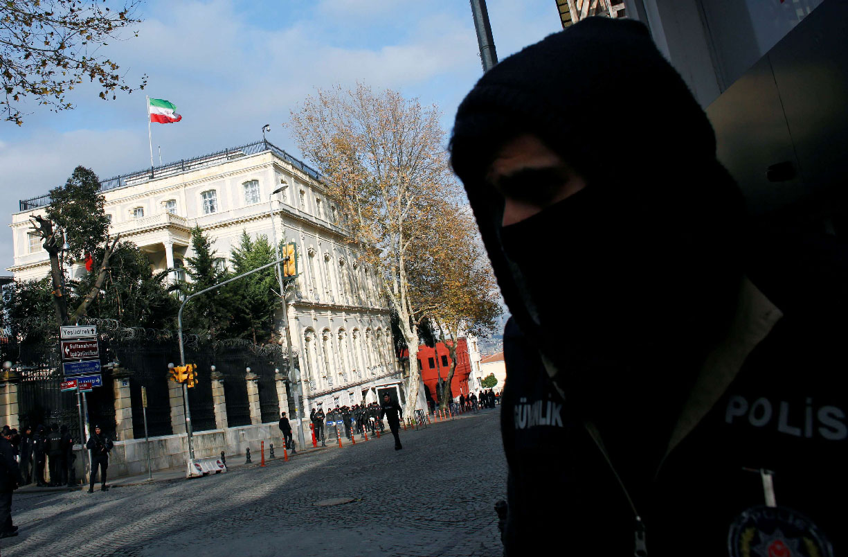 A Turkish police officer stands guard in front of the Iranian Consulate in Istanbul