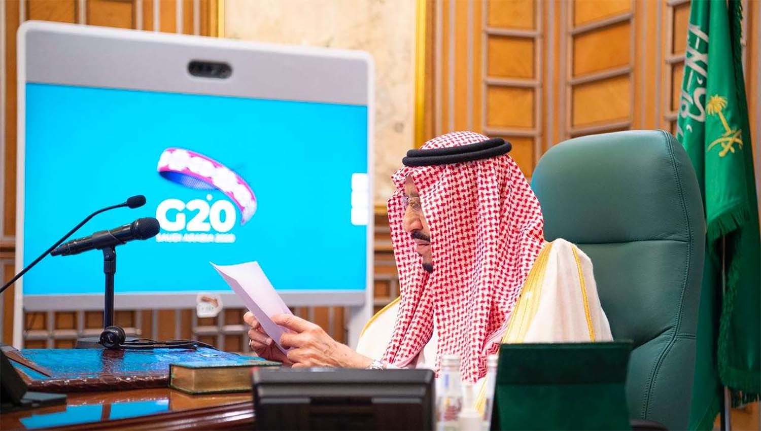 Saudi King Salman bin Abdulaziz speaks via video link during a virtual G20 summit on coronavirus disease