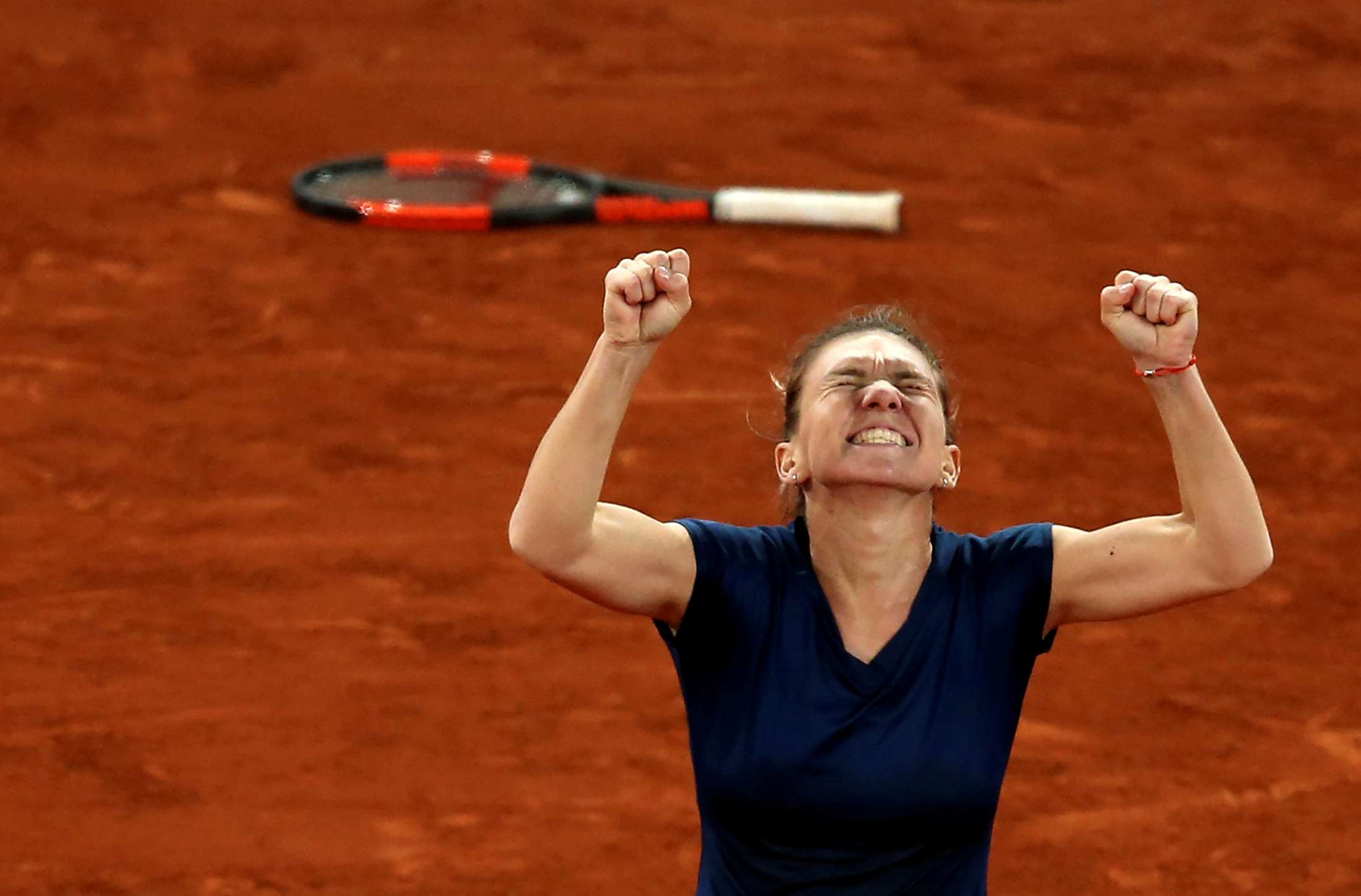  هاليب تعزز الشكوك حول مشاركتها على الملاعب الصلبة