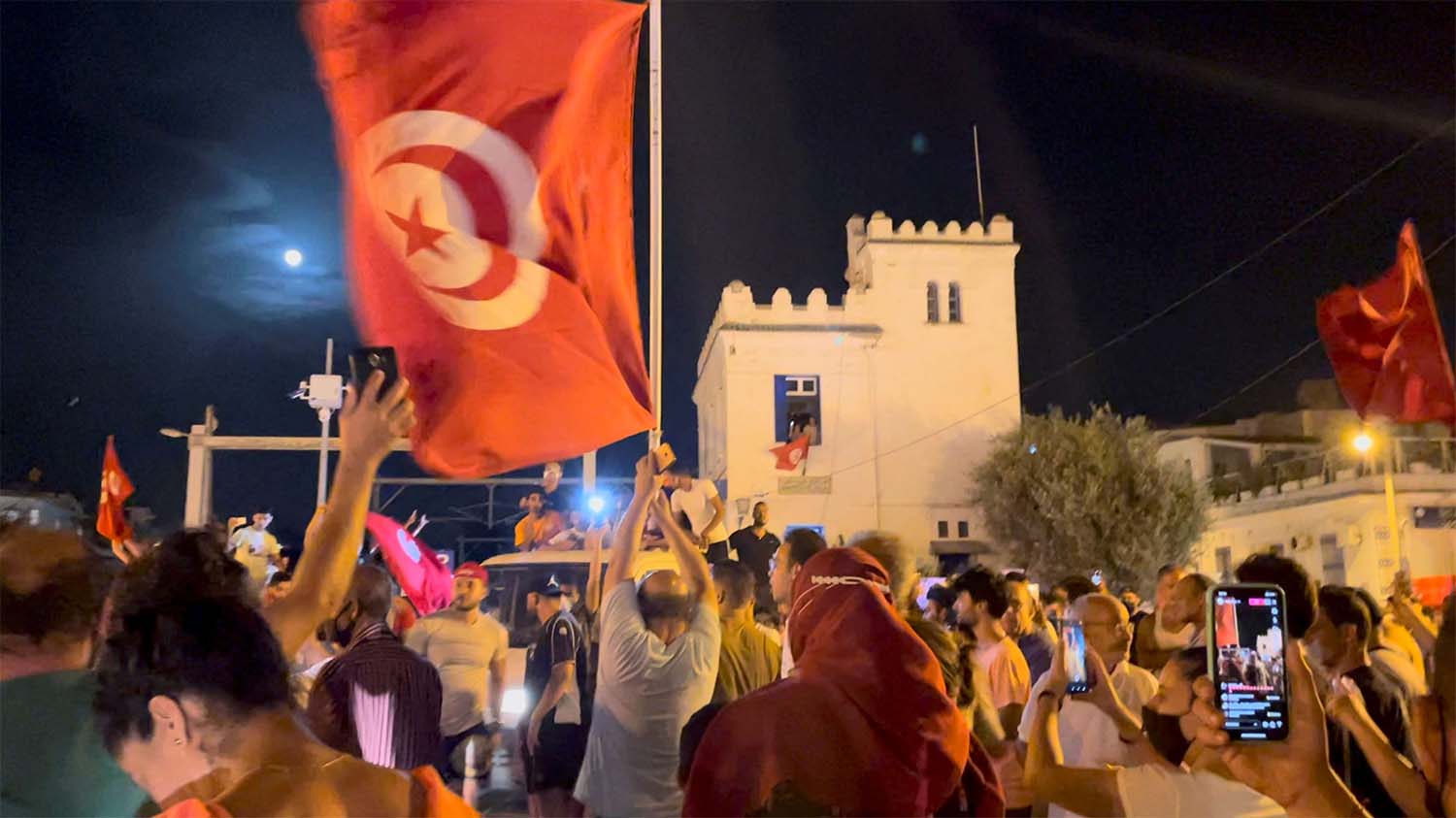 Tunisians defied the COVID-19 curfew to celebrate Saied's decision