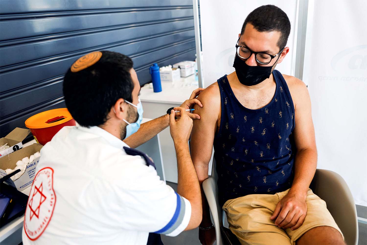 Israel is offering third booster shots to its entire eligible population