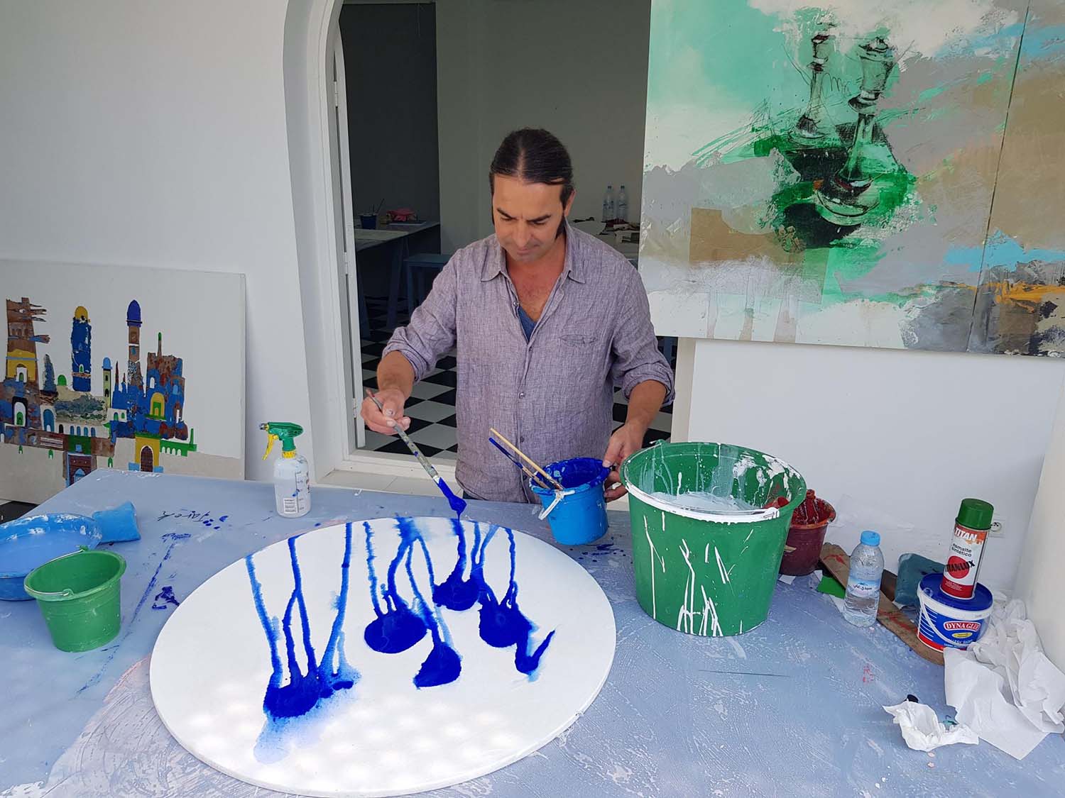The blue colour dominates Tarek Faitah's paintings