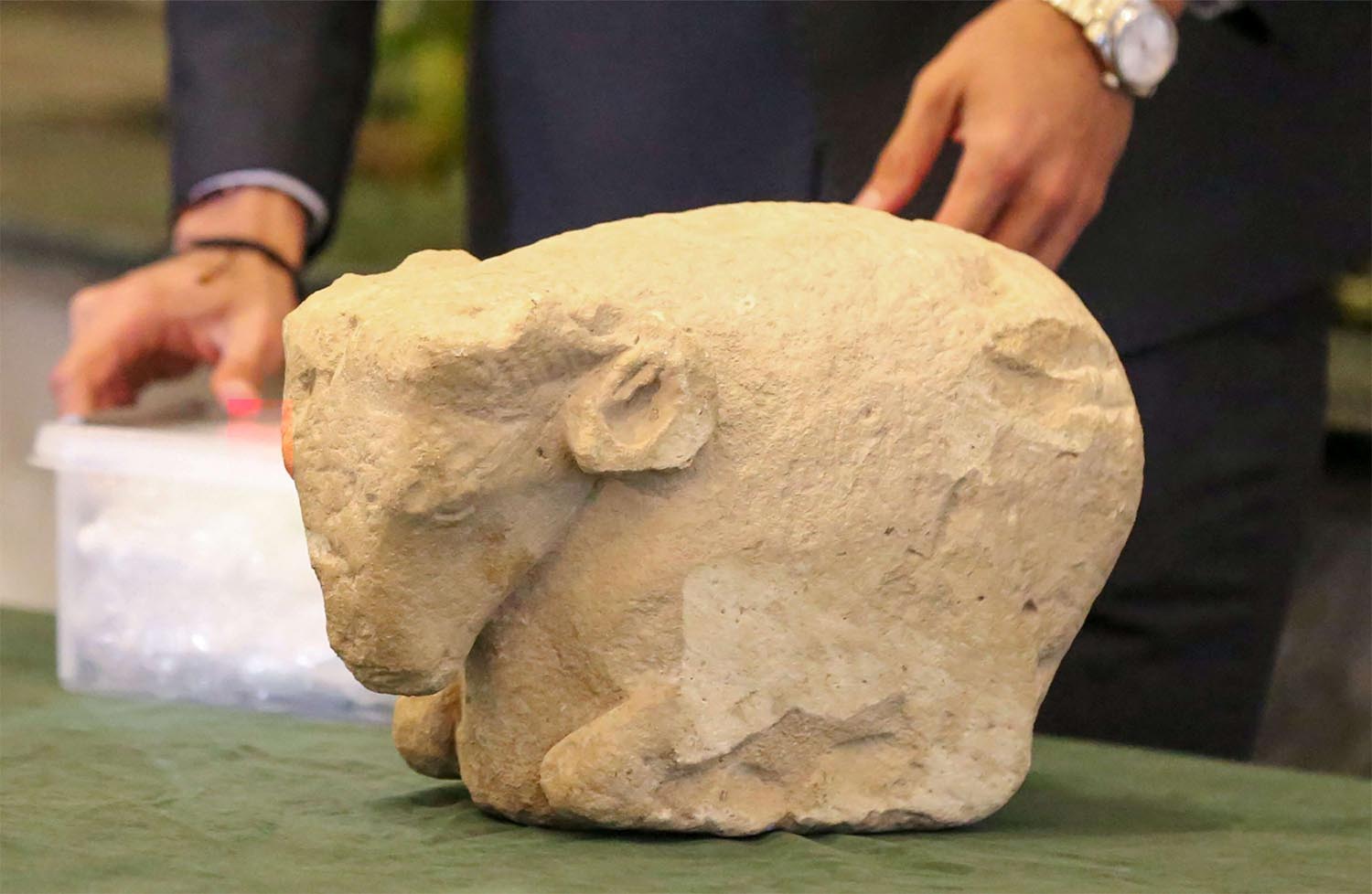 A Sumerian ram's head is displayed