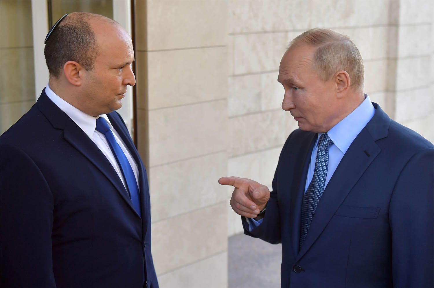 Russian President Vladimir Putin talks to Israeli Prime Minister Naftali Bennett 