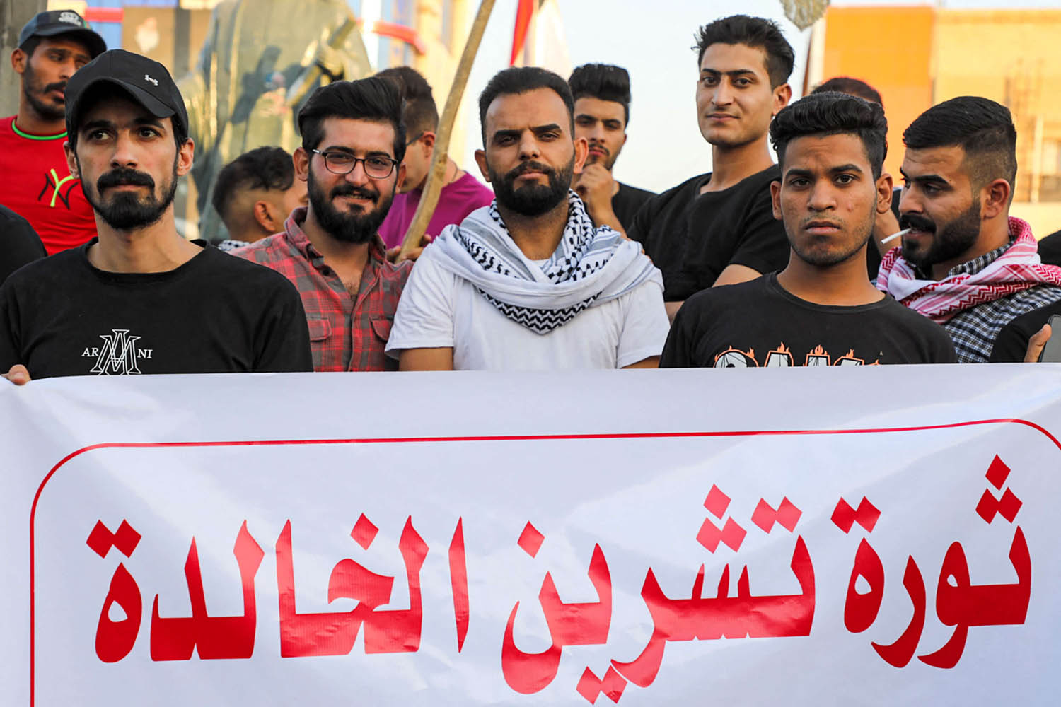 متظاهرون عراقيون في ساحة الحبوبي في الناصرية جنوب العراق