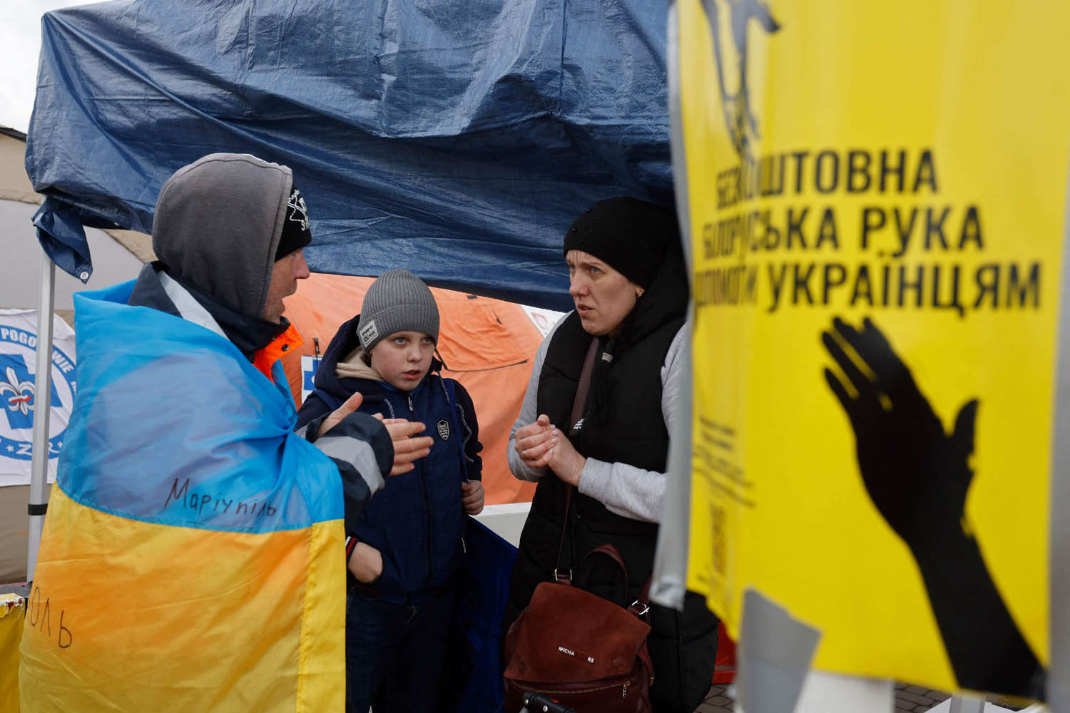 لاجئون أوكرانيون على الحدود البولندية