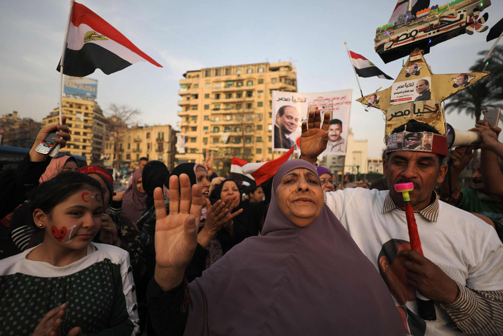 مصريون يحتفلون بإعادة انتخاب السيسي رئيسا لمصر في 2018
