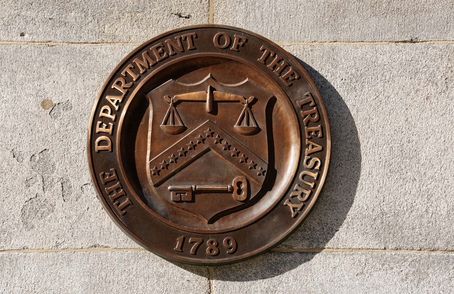 A bronze seal for the Department of the Treasury is shown at the US Treasury building in Washington