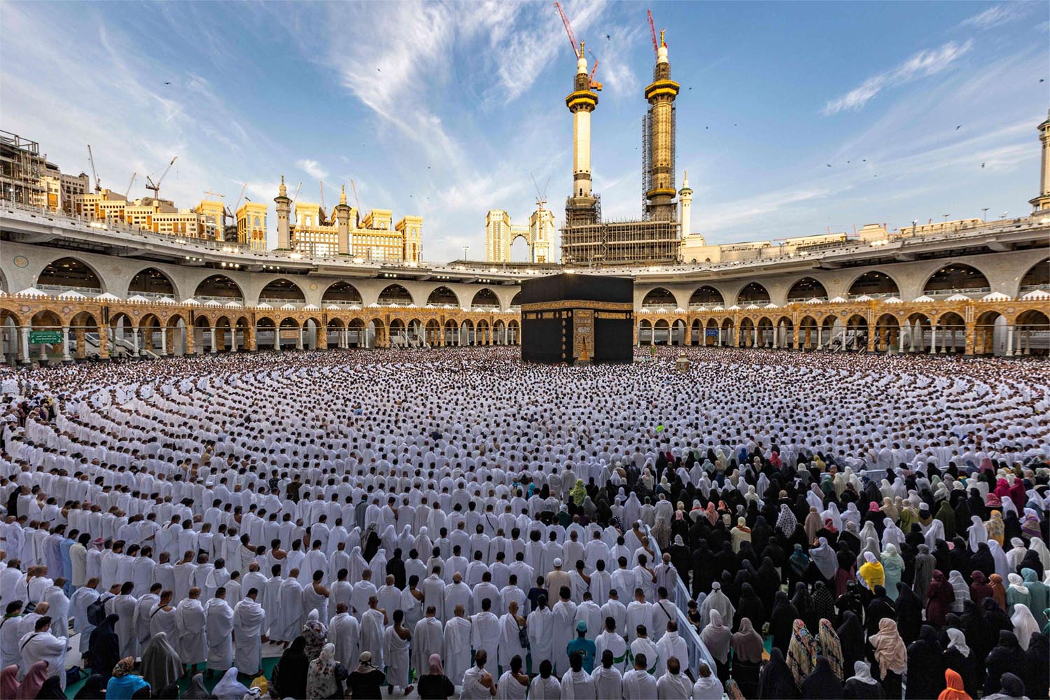 Muslim worshippers pray around the Kaaba, Islam's holiest shrine, at the Grand Mosque in Mecca