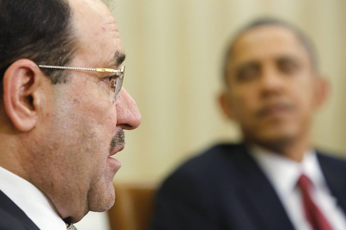 الرئيس الأميركي الأسبق باراك أوباما يلتقي رئيس الوزراء العراقي الأسبق نوري المالكي (2013)