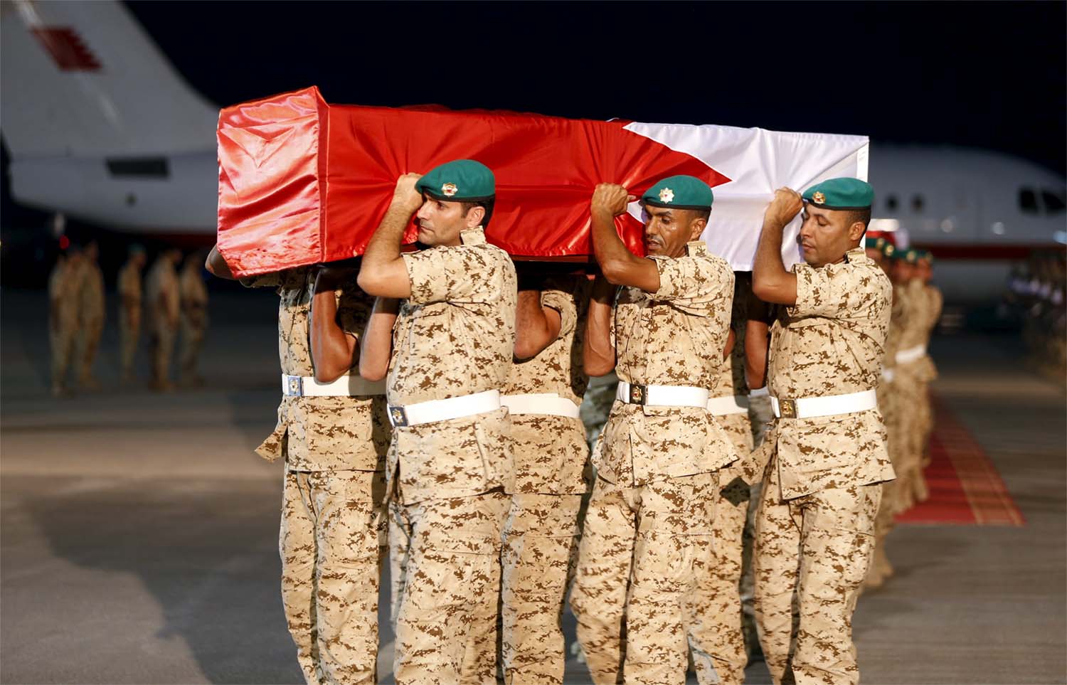 An archive photo of the coffin of a Bahraini soldier is carried by a guard of honour in September 2015