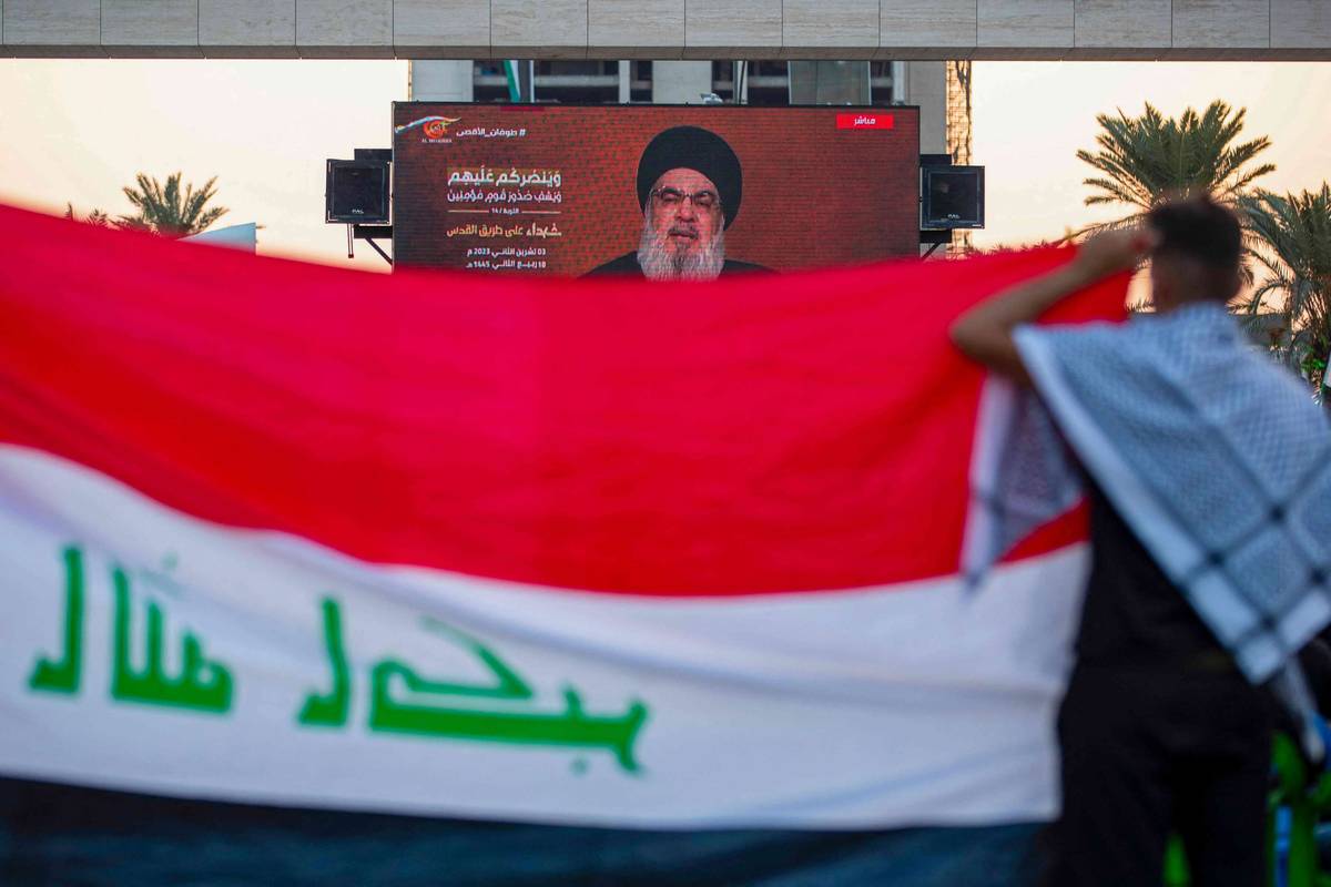 شاشة عملاقة في ساحة التحرير وسط بغداد تبث خطاب حسن نصرالله