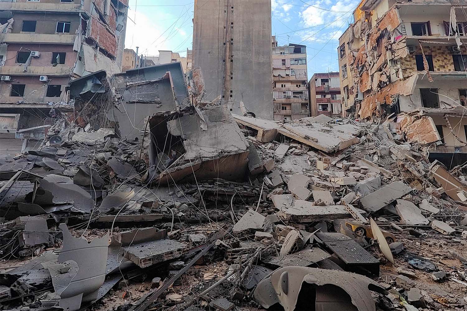Rubble lies at a site damaged in the aftermath of Israeli strikes on Beirut's southern suburbs