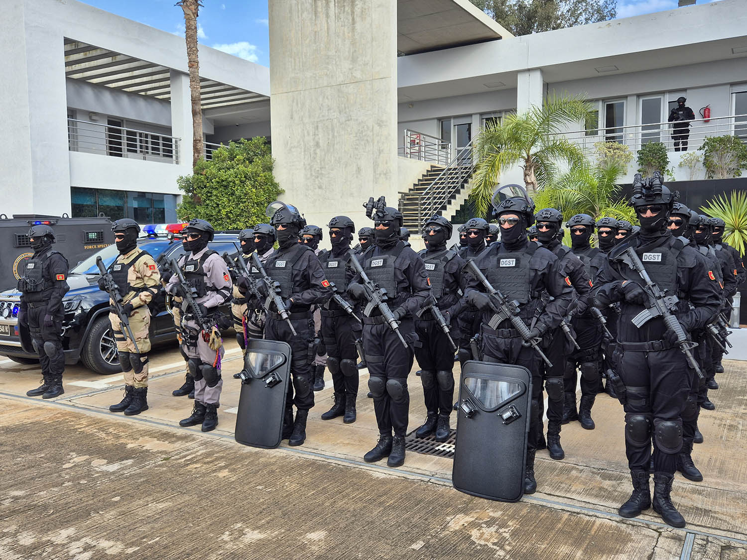 BCIJ security forces at the headquarters of the Central Bureau of Judicial Investigations in Sale