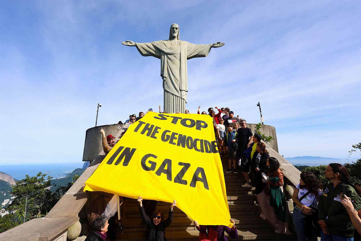 Activists in Rio de Janeiro hold a banner that reads Stop the genocide in Gaza, during a protest to demand an immediate ceasefire in the region and the urgent entry of humanitarian aid for the Palestinians
