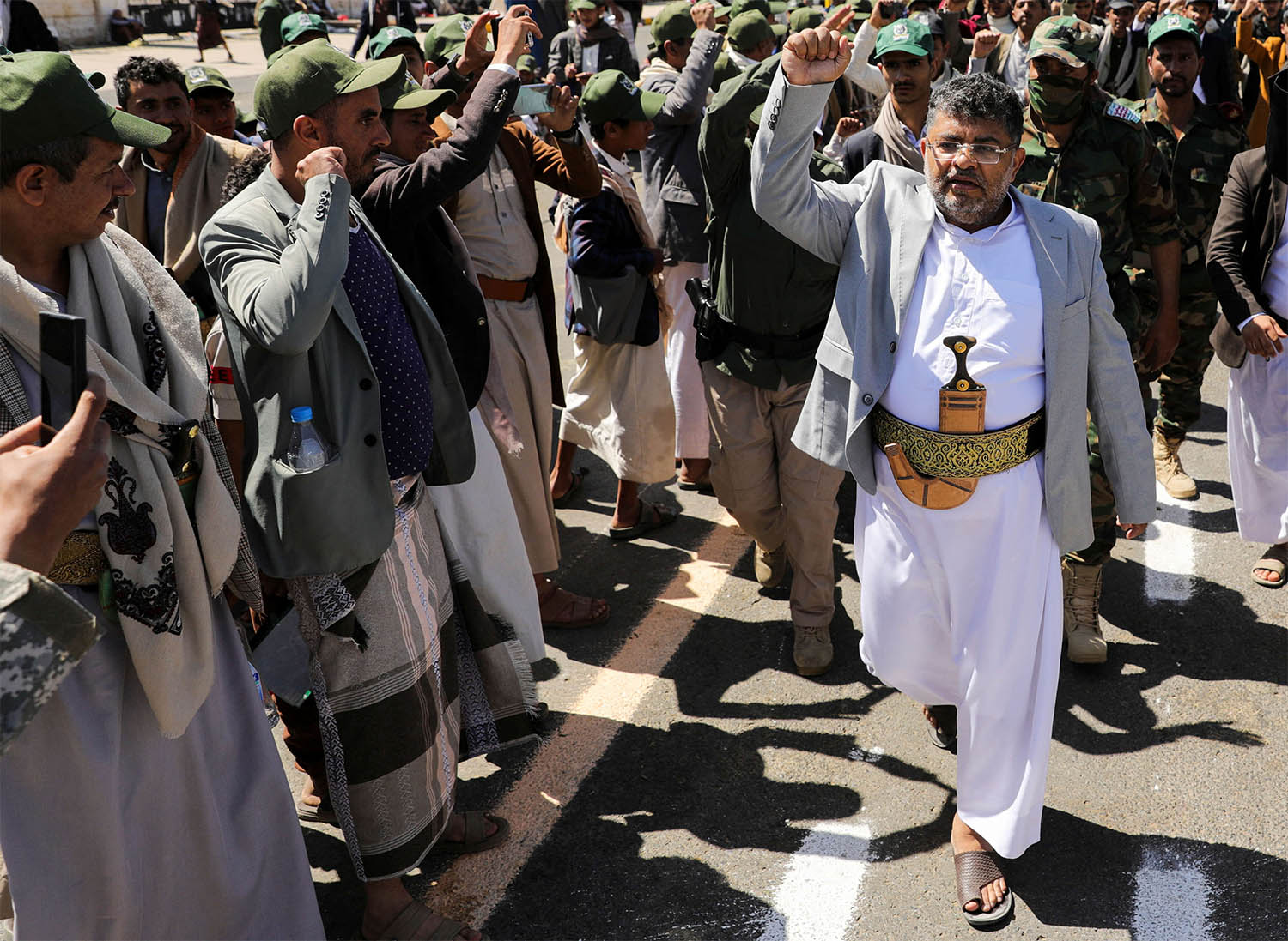 Houthi leader, Mohammad Ali al-Houthi, gestures to supporters in Sanaa