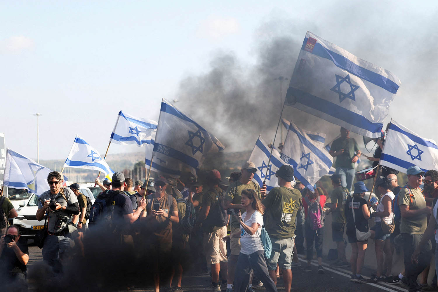 Demonstrators block Israel's main highway connecting Jerusalem and Tel Aviv