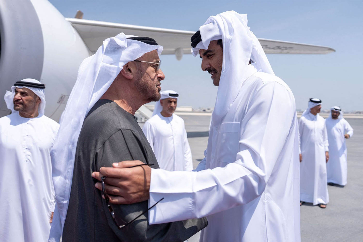 atar's Emir Sheikh Tamim bin Hamad al-Thani (R) welcoming UAE President Sheikh Mohamed bin Zayed al-Nahyan in Doha on September 10