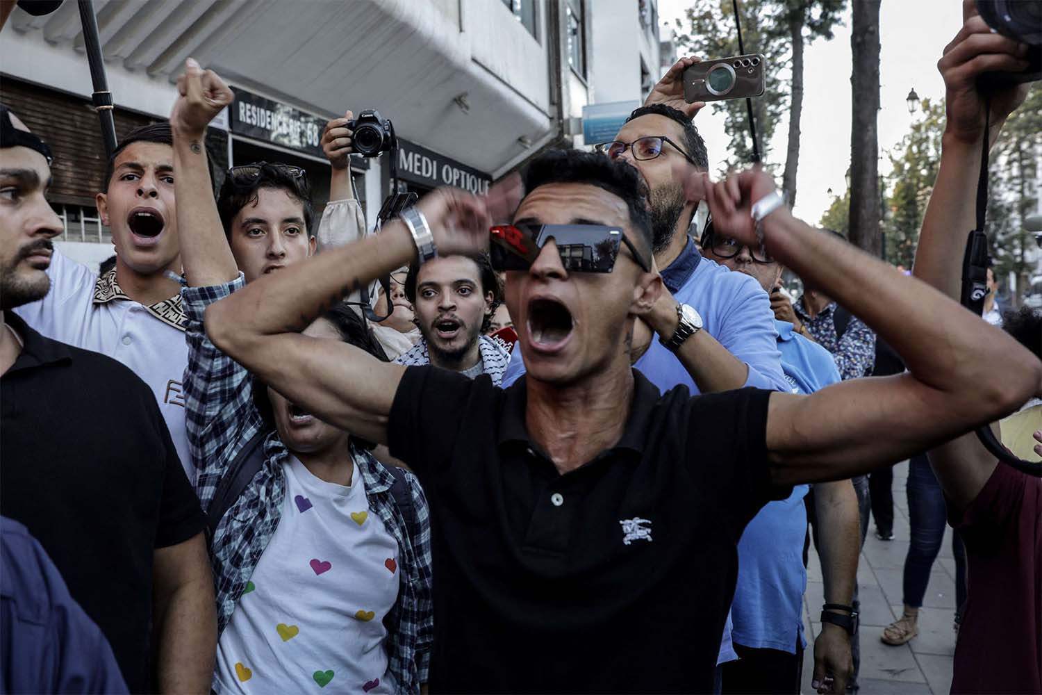Moroccan youths demonstrate peacefully demanding reforms in the healthcare and education sectors in Rabat 