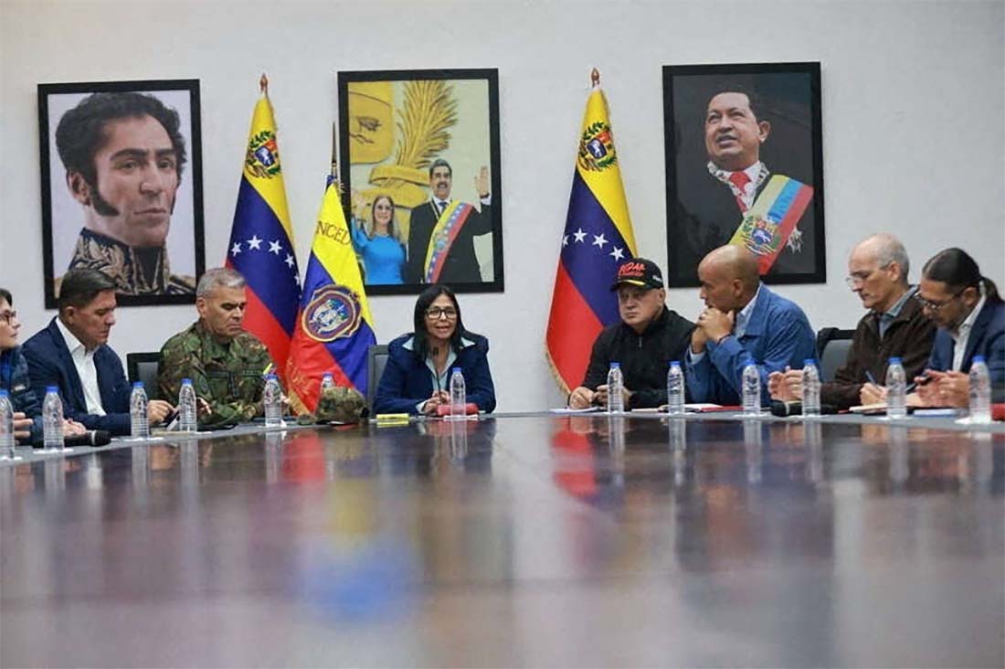 Venezuela's acting president Delcy Rodríguez (C)