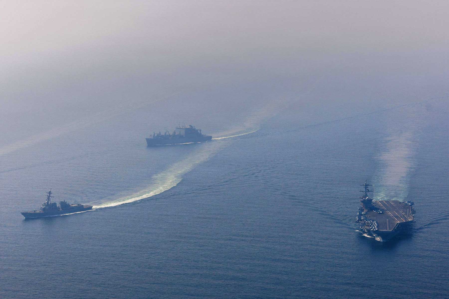 Talks advance amid threats, naval pause and Hormuz tensions