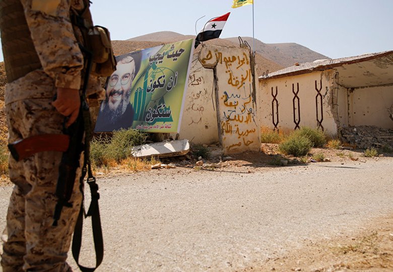 صورة نصر الله في سوريا