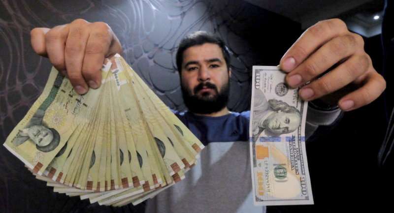 الريال الايراني مقابل الدولار