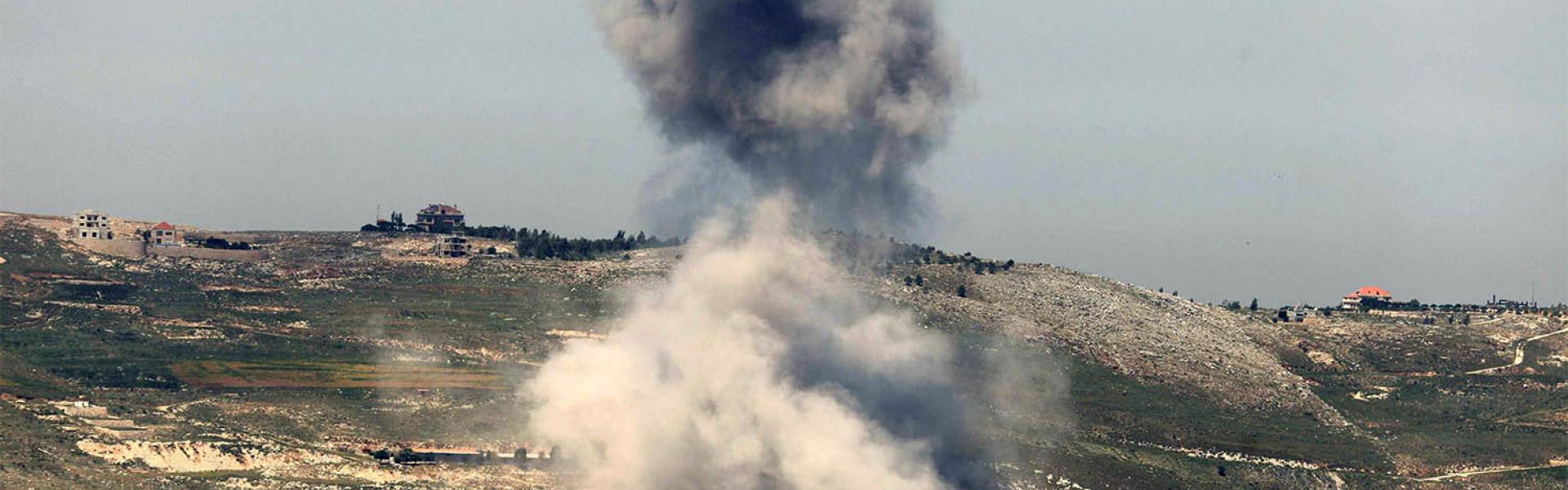 Smoke billowing from the site of Israeli airstrikes on the hills of the southern Lebanese village of Nabatiyeh