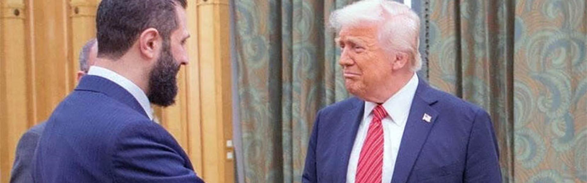 Trump shaking hands with Sharaa