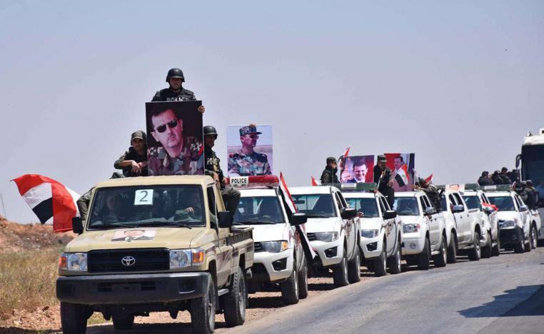 قافلة من قوات الأمن السوري تدخل منطقة كانت خاضعة لسيطرة الجماعات الاسلامية