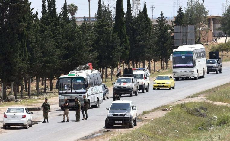 حافلات تقل المسلحين