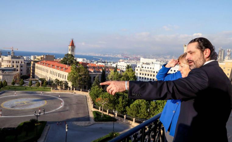 الحريري مع ميركل يلقيان نظرة على وسط بيروت التجاري