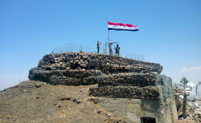قوات سورية ترفع العلم فوق احدى المناطق التي استعادت السيطرة عليها