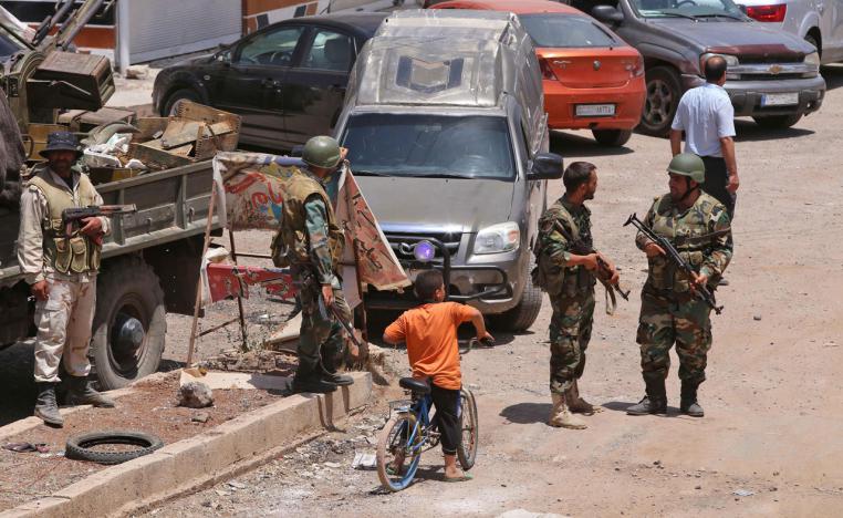 القوات السورية في منطقة تم استعادة السيطرة عليها بالمفاوضات