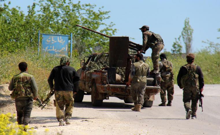 مقاتلون من المعارضة السورية في احدى مناطق ادلب