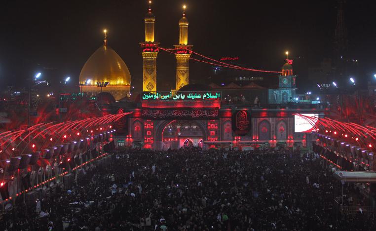 Shiite pilgrims take part in a ceremony at the Imam Hussein shrine in the southern Iraqi city of Karbala on September 19, 2018, on the eve of the tenth day of the mourning period of Muharram, which marks the peak of Ashura.