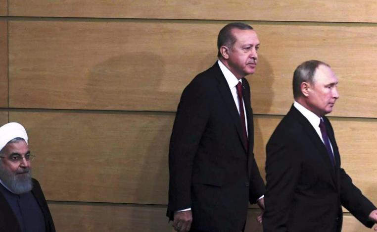 الرؤساء الروسي فلاديمير بوتين والتركي رجب طيب اردوغان والإيراني حسن روحاني