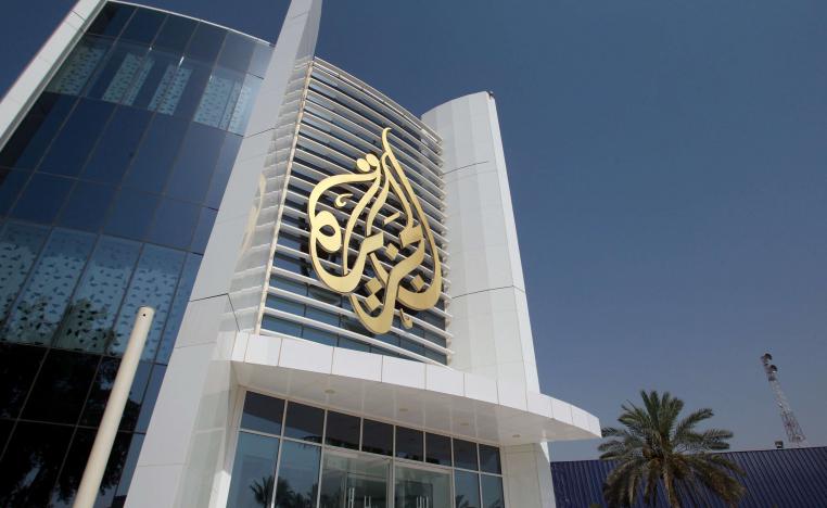 Al Jazeera Media Network logo is seen on the channel's headquarters building in Doha, Qatar on June 8, 2017.