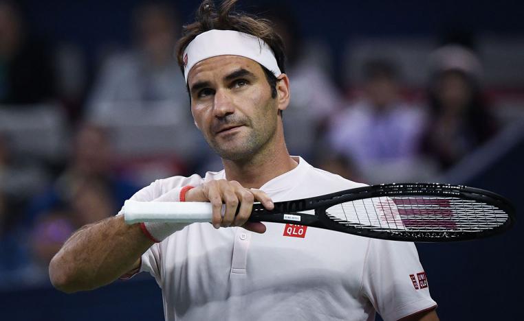 فيدرر في ربع النهائي بصعوبة بالغة