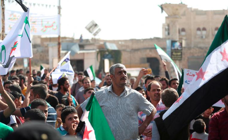Bahr Nahhas (C) attends a demonstration in the rebel-held town of Maaret al-Numan, in the north of Idlib province on October 19, 2018.