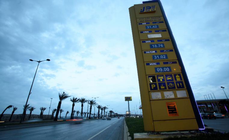 A Naftal billboard shows prices at the entrance of the fuel station in the highway of Algiers, Algeria February 3, 2016.
