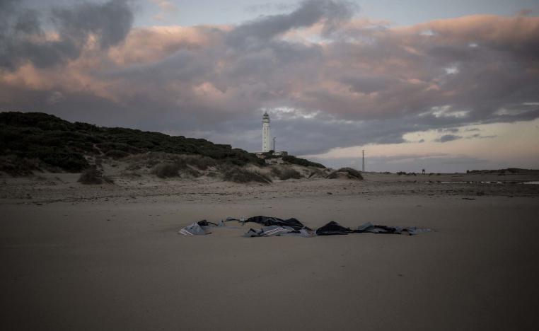 Remains of a dinghy lies on the beach near the village of Canos de Meca in southern Spain, Tuesday, Nov. 6 2018