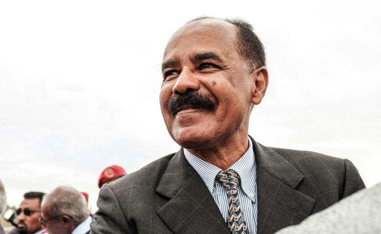 Eritrea's President Isaias Afwerki smiles upon his arrival at the airport in Gondar