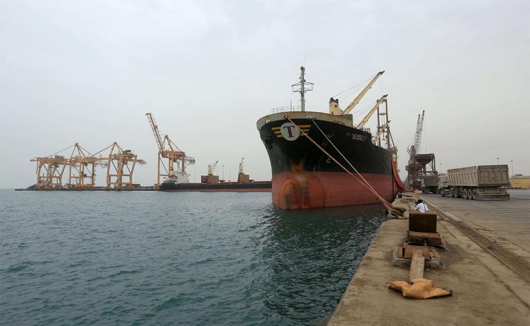 A ship carrying a shipment of grain is docked at the Red Sea port of Hodeidah