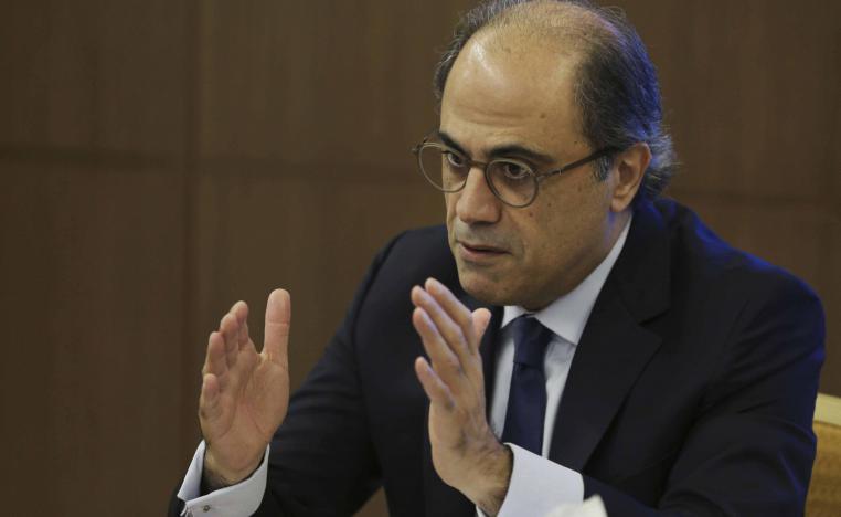 Jihad Azour, the IMF's Mideast and Central Asia director, talks during his press conference in Dubai, United Arab Emirates
